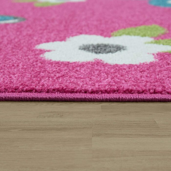 Домашній дитячий килим Paco, дитячий ігровий килим з коротким ворсом, квіти-метелики рожевого кольору, розмір (120 x 170 см)
