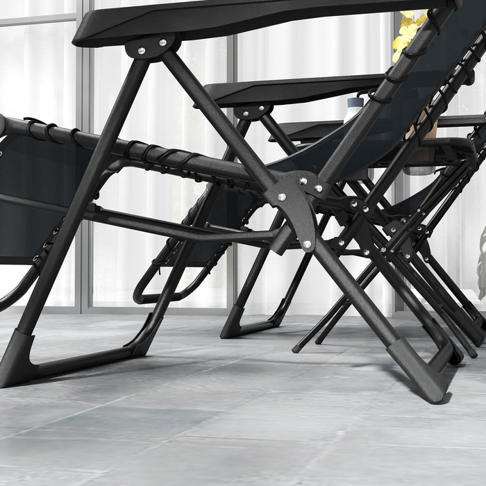 Набір із двох лежаків для відпочинку на сонце, розкладні, з регулюванням під кутом напівлежання (Zero Gravity), з підголовниками та столом-табуретом, що входить до комплекту, та двома тримачами для напоїв.