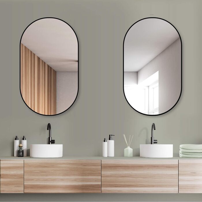 Дзеркало настінне овальне HOKO Design 45x75 см з металевим матовим каркасом. Можлива вертикальна та горизонтальна установка. Підходить для ванної кімнати, коридору, спальні та вітальні.