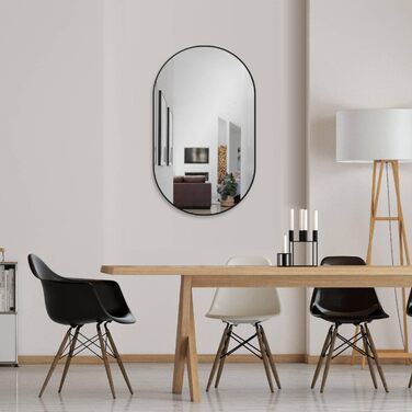 Дзеркало настінне овальне HOKO Design 45 x 75 см з металевим матовим каркасом. Можлива вертикальна та горизонтальна установка. Підходить для ванної кімнати, коридору, спальні, вітальні.