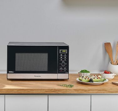 Мікрохвильова піч Panasonic NN-GD35HBGTG з грилем та функцією пару (23 л, 1000 Вт, чорна) комбінована, для приготування на пару та розігріву піци