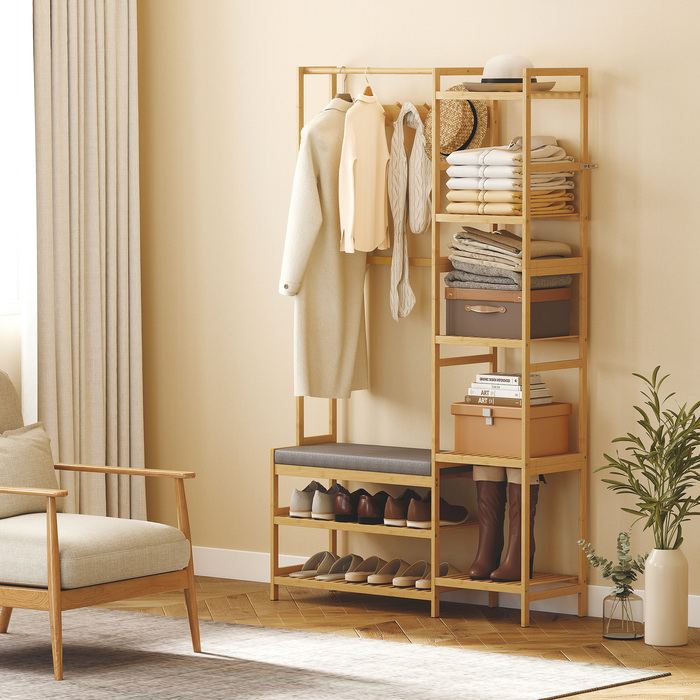 Етажерка для одягу з полицею для взуття, гачками для одягу, вішалкою для пальто, лавкою з подушкою – ідеальне рішення для передпокою або вхідної зони. Виготовлена з натурального дерева.
