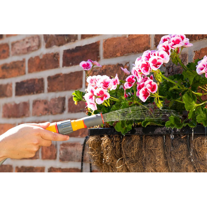 HOZELOCK Автоматичний шланг на котушці Auto Reel 40 м: автоматичне змотування, проста установка. В комплекті: шланг-розпилювач, з'єднувачі, 40 м шланга Hozelock та кріплення. 5 років гарантії [2595R0000] (45 x 49 x 28.4 см)