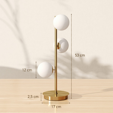 Настільна лампа з трьома сферичними плафонами, міцний сталевий постамент, патрони G9, розміри 24 x 24 x 53 см, латунь.