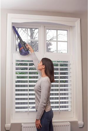 Акумуляторний ручний пилосос BLACK+DECKER 18В 36Вт Dustbuster з технологією smarttech, циклонною системою, висувною щілинною насадкою, щіткою для шерсті тварин, настінною зарядною станцією, титан/срібло/фіолетовий