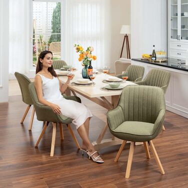 Крісло для їдальні Cosy - обертове, з підлокітниками, зелене, на дерев'яних ніжках