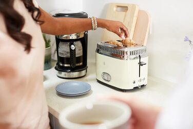 Тостер Russell Hobbs Retro 21680-56 нержавіюча сталь, 2 відділення, кремовий. З підставкою для булочок, 6 режимів, розморожування та підігрів, 1300 Вт