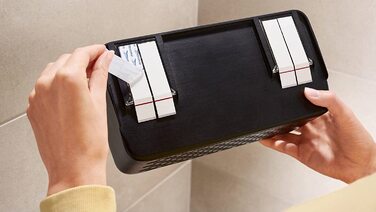 Полиця для душу tesa LAVAA M, чорна матова, настінна без свердління, з водостійкими смужками Powerstrips, 260x130x110 мм