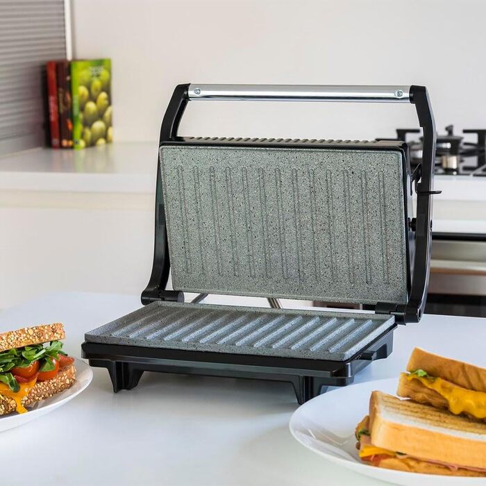 Електрогриль Cecotec Rock'nGrill 700W з антипригарним покриттям, 23x14.5 см, без PTFE та PFOA, плаваюча платформа, холодний ручка, індикатор, вертикальне зберігання